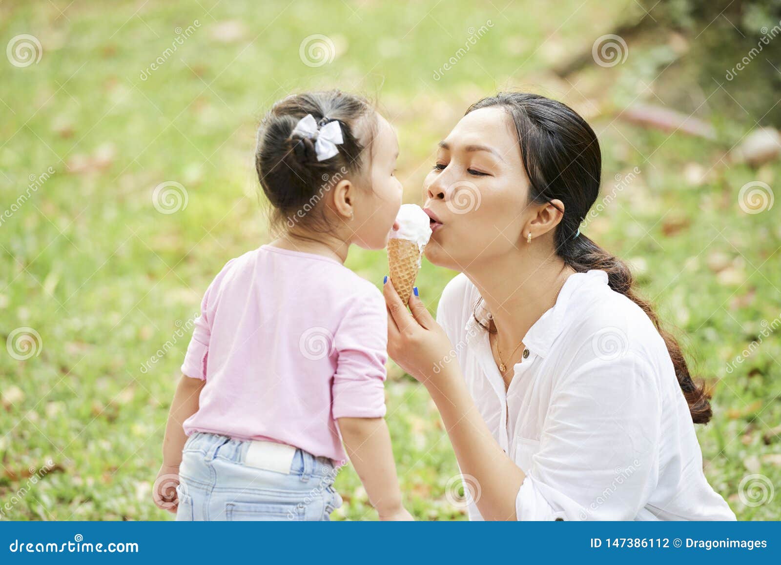 Mother Daughter Licking with lotion