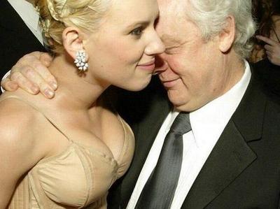 barack obomba add photo scarlett johansson boob suck