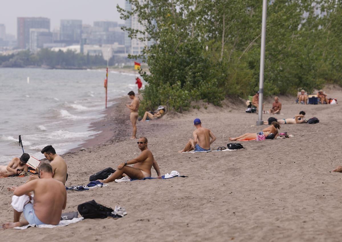 alexander c smith recommends nude beach group photo pic